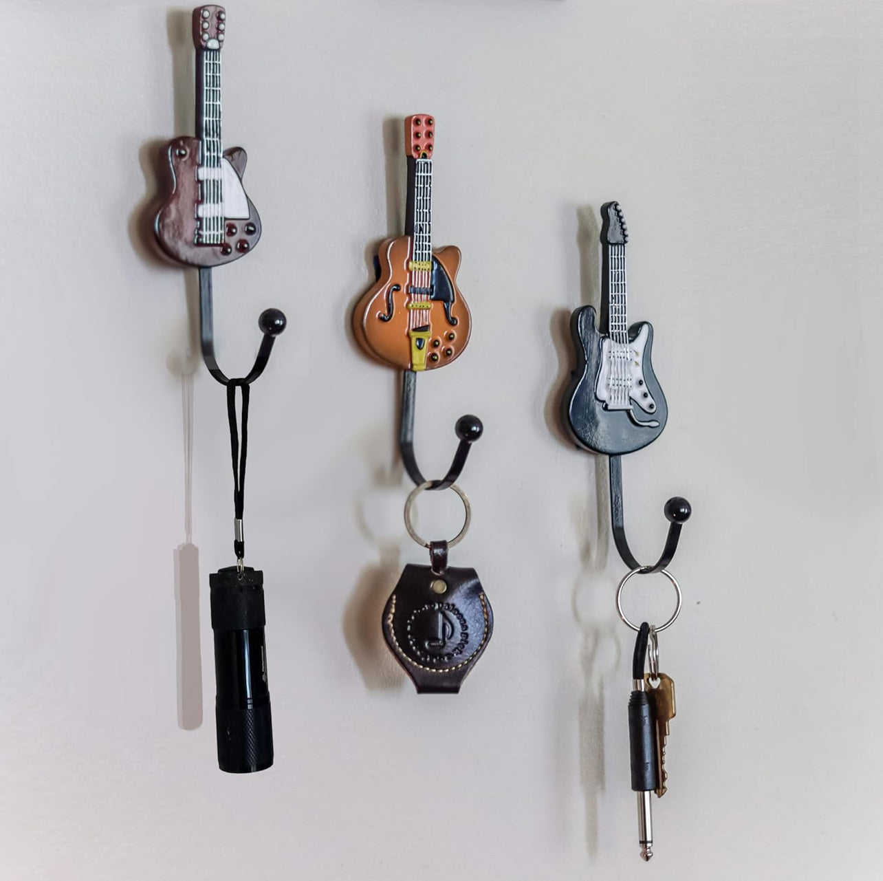 Pick-A-Palooza Nuevo de, Gancho para abrigos con forma de guitarra de estilo vintage