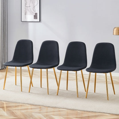 sillas de comedor negras modernas con patas doradas