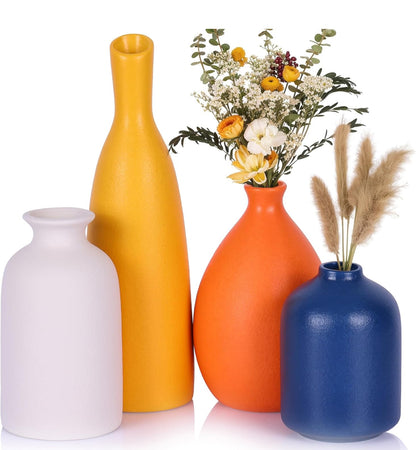 Juego de 4 tarros pequeños de cerámica coloridos para decoración del hogar. 