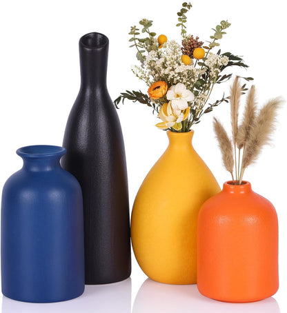 Juego de 4 tarros pequeños de cerámica coloridos para decoración del hogar. 