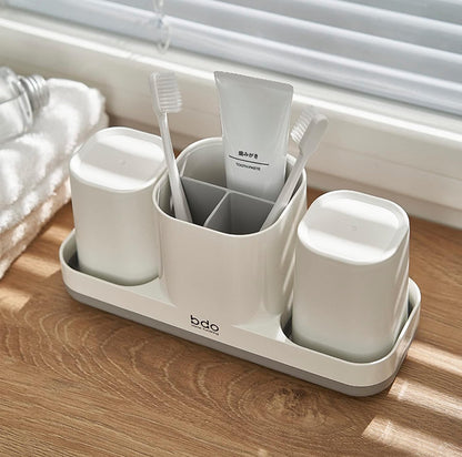 Soporte para cepillos de dientes con taza para cepillos de dientes. 