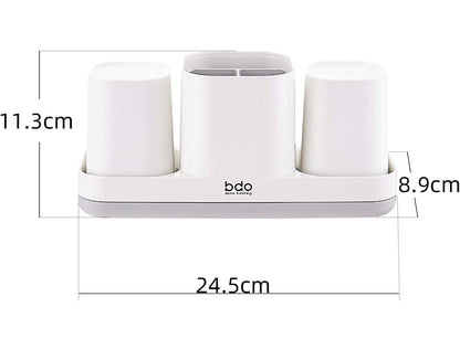 Soporte para cepillos de dientes con taza para cepillos de dientes. 