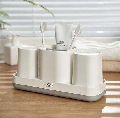 Soporte para cepillos de dientes con taza para cepillos de dientes. 