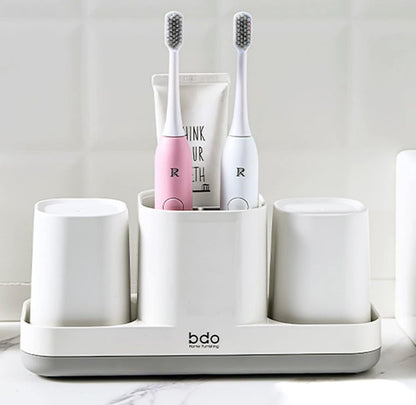 Soporte para cepillos de dientes con taza para cepillos de dientes. 