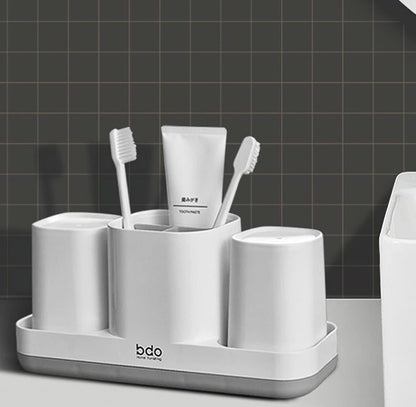 Soporte para cepillos de dientes con taza para cepillos de dientes. 