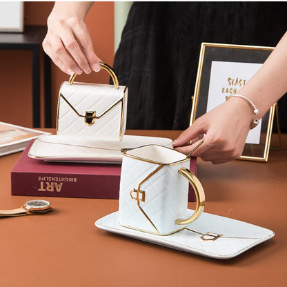 Juego de tazas de café de cerámica con forma de bolsa y platillo con cuchara y platillo para mujeres,
